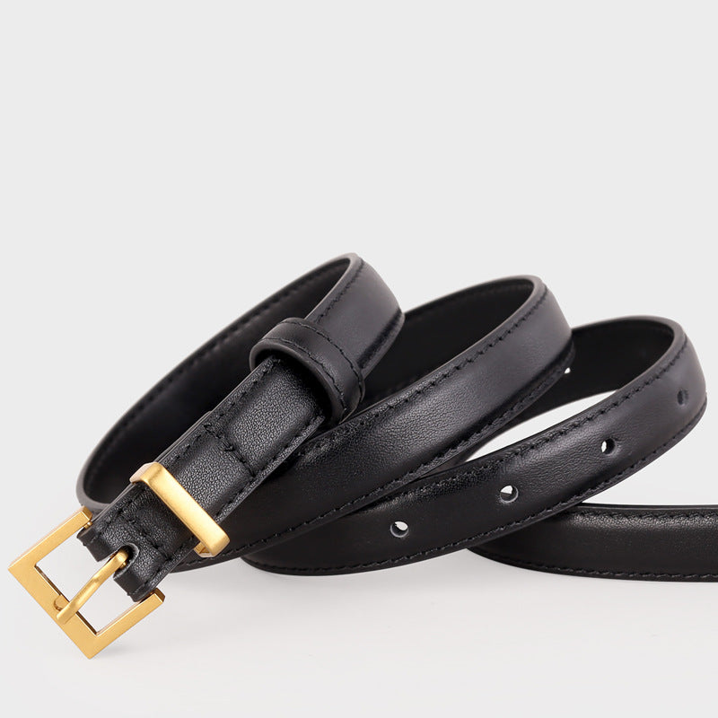 Black leather skinny belt with a gold square buckle and adjustable holes.