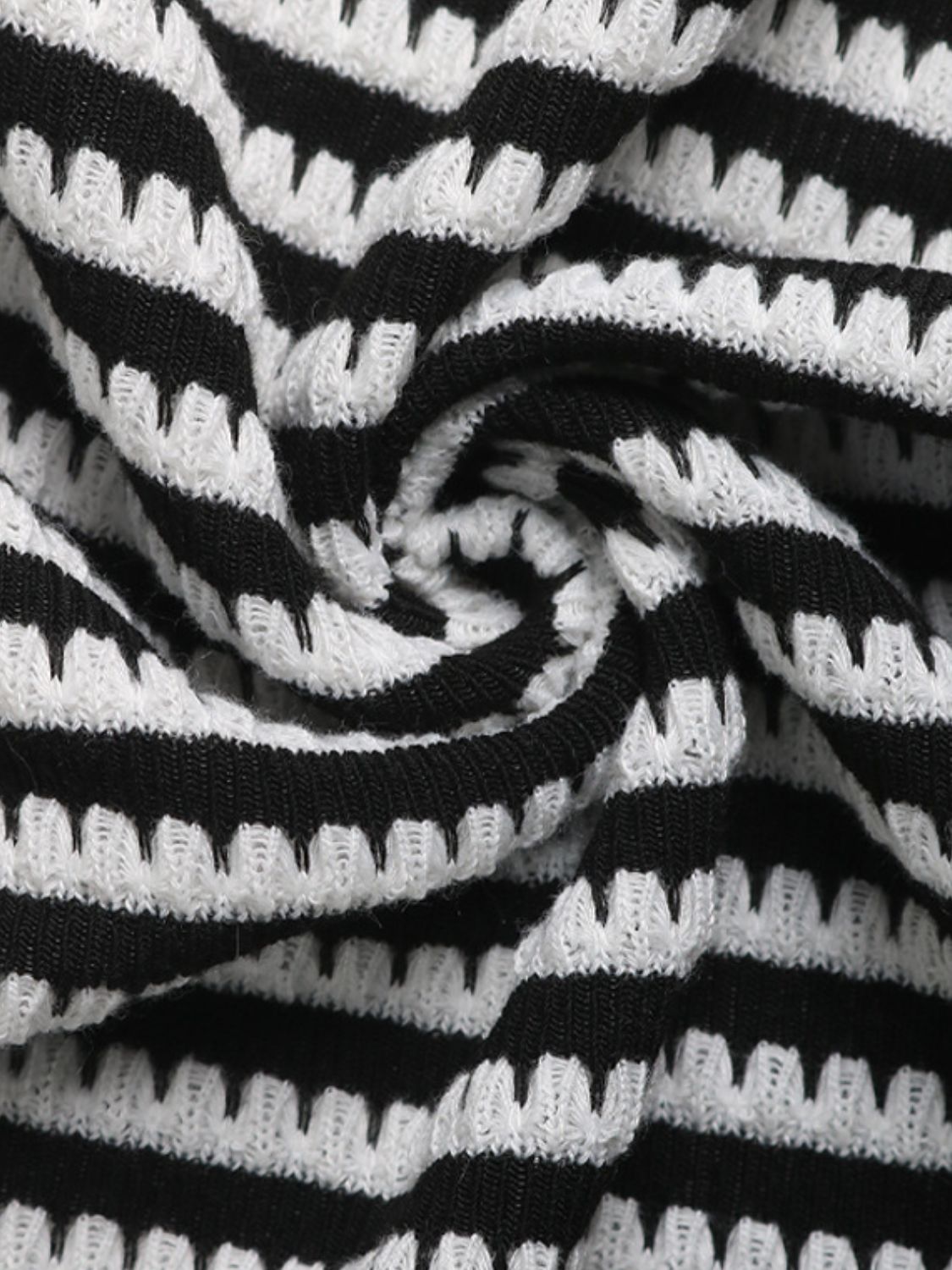 Black and white striped textured knit fabric detail