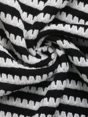 Black and white striped textured knit fabric detail
