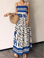 Blue spaghetti strap maxi dress with sardine print and text detail.
