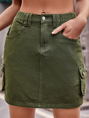 Army green denim mini skirt with cargo pockets and a button closure.