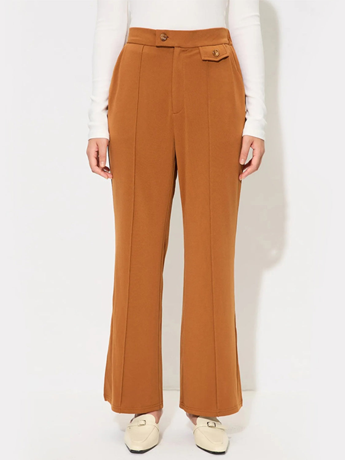 Seamed flare-leg tailored trousers in sherbet with button detail and pocket.
