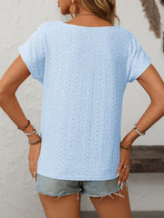 Light blue eyelet knit t-shirt with short sleeves and a scoop neck.