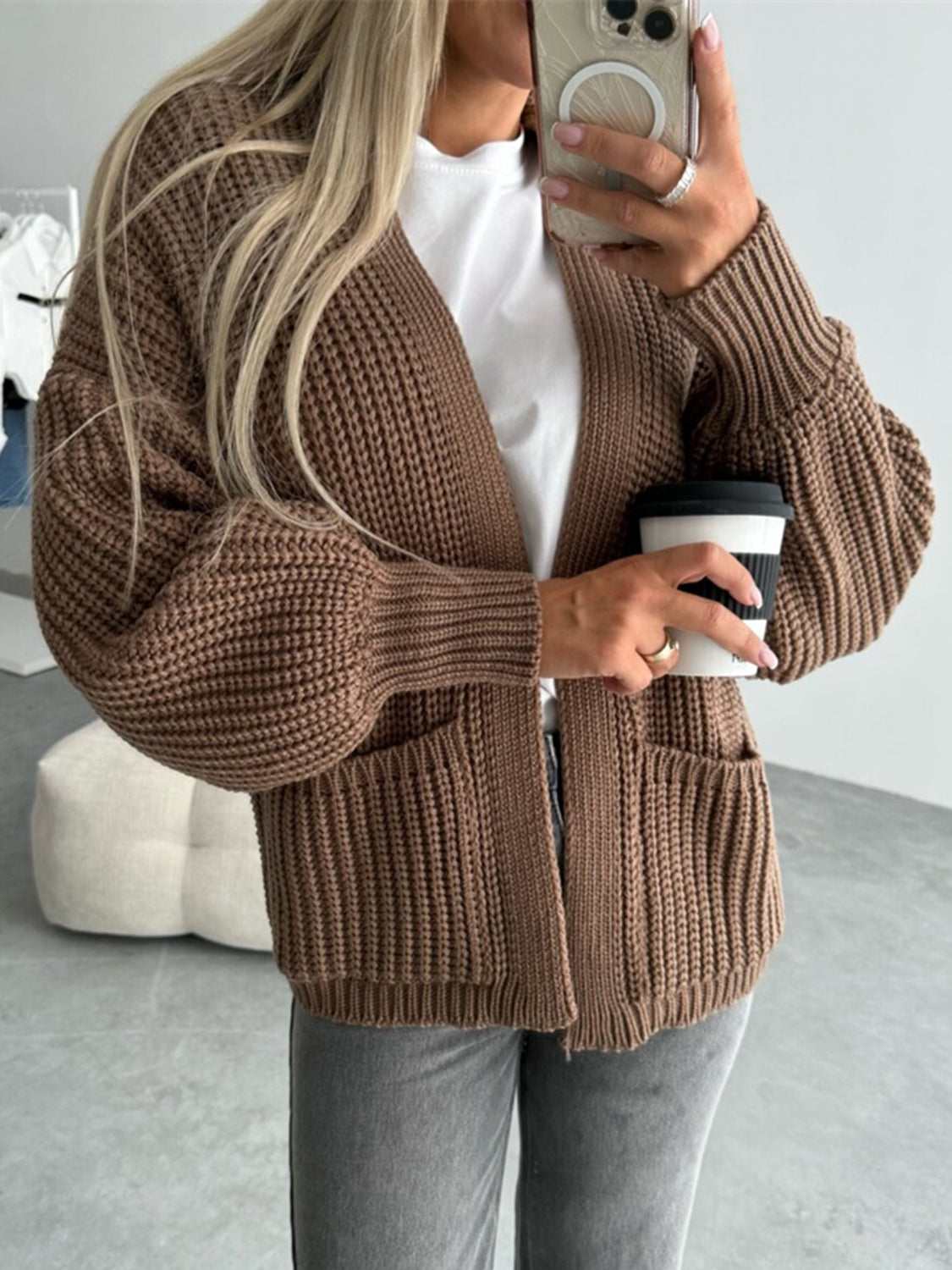 Textured puff sleeve cardigan in mocha with pockets and ribbed cuffs.