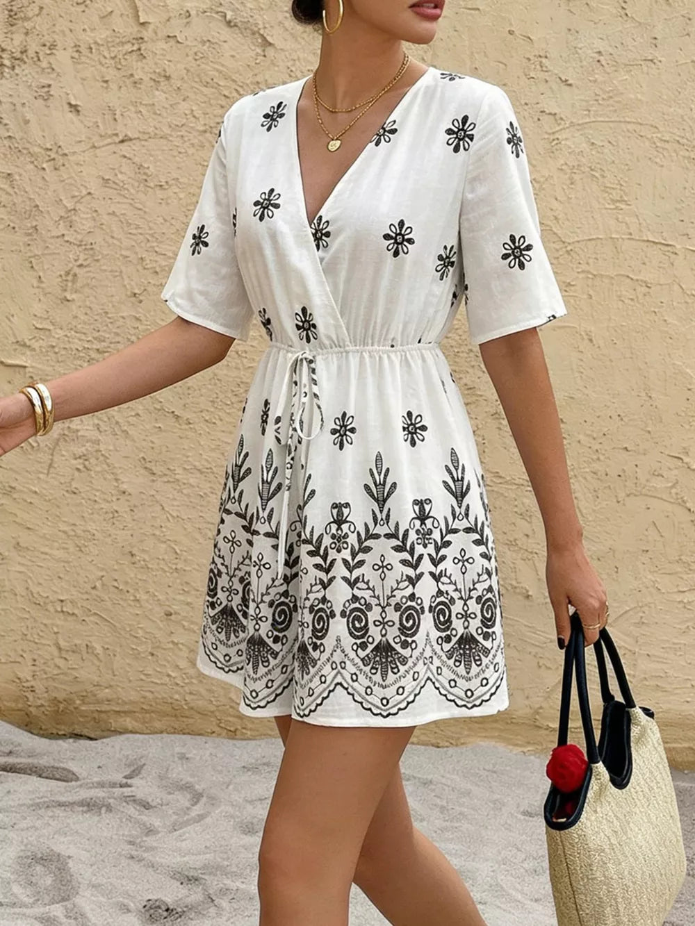 Printed Surplice Half Sleeve Romper in White, side view