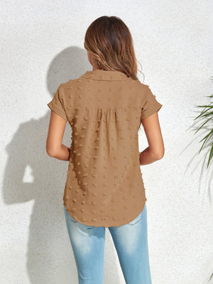 Textured dot poplin shirt in khaki with short sleeves and a collared neckline.