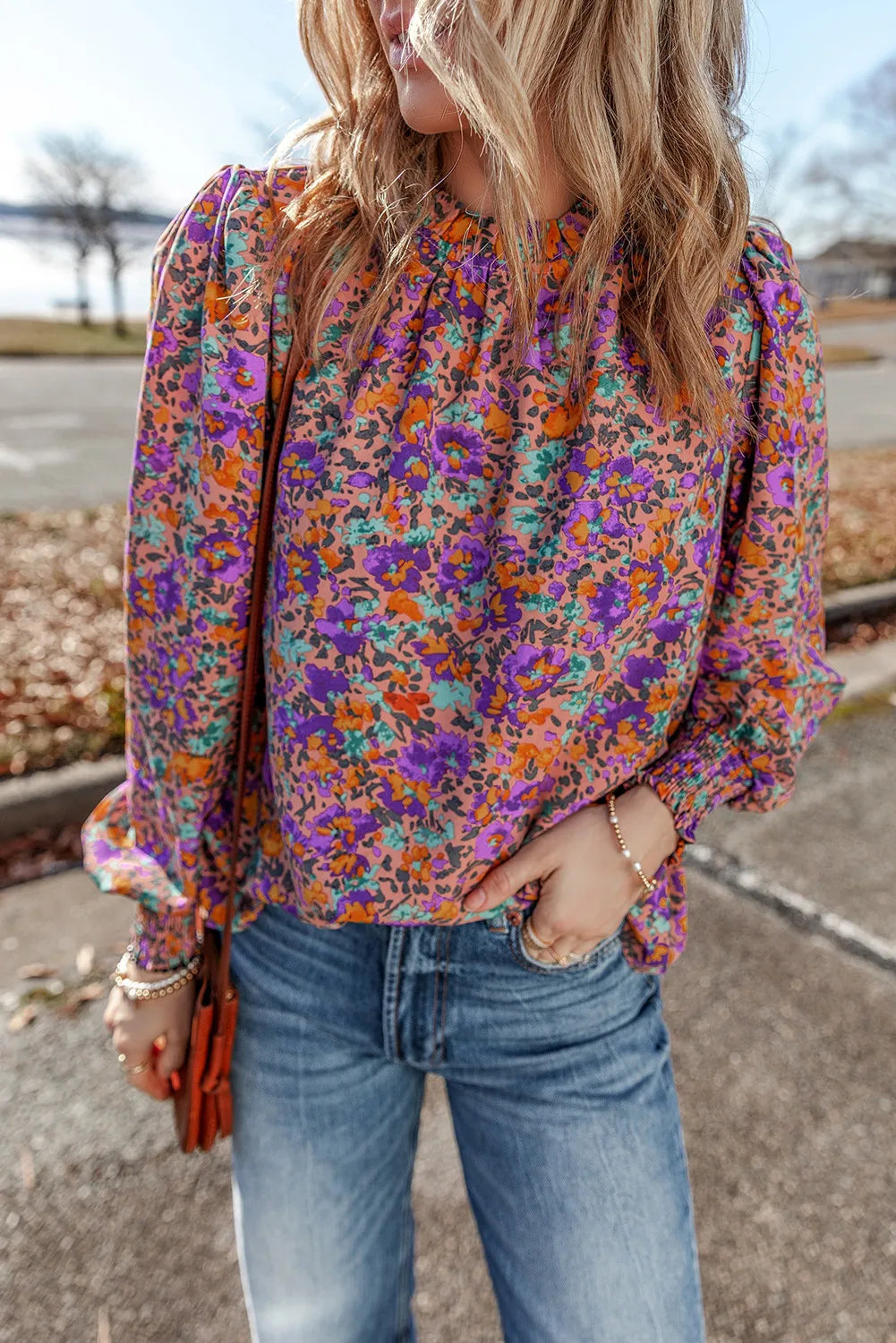 Purple floral print blouse with gathered sleeves and mock neck