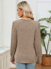Khaki ribbed knit sweater with crochet trim detail and long sleeves.