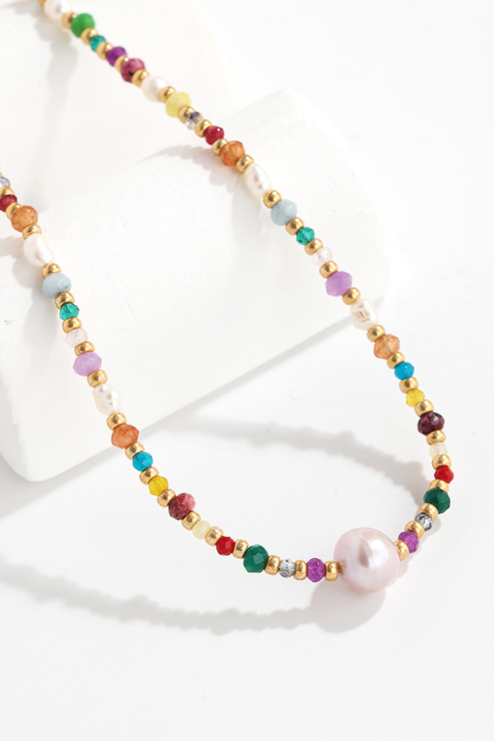 Multicolor beaded gemstone and pearl necklace with gold accents