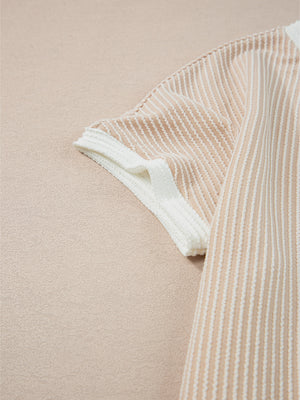 Beige striped t-shirt dress with white ribbed trim on the sleeves.