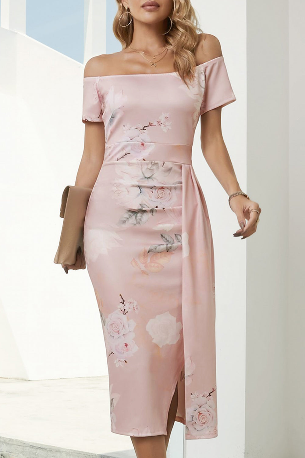 Blush pink off-shoulder midi dress with floral print and side slit.