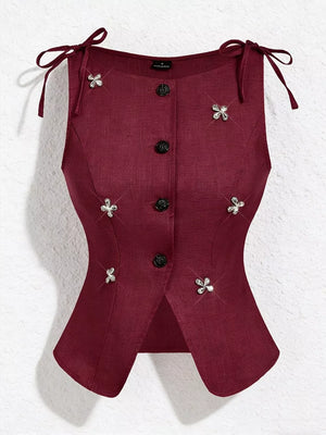Burgundy tie-shoulder vest with button front and floral appliqués