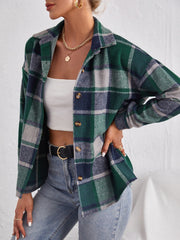Oversized dark green plaid shacket with button closure and spread collar.