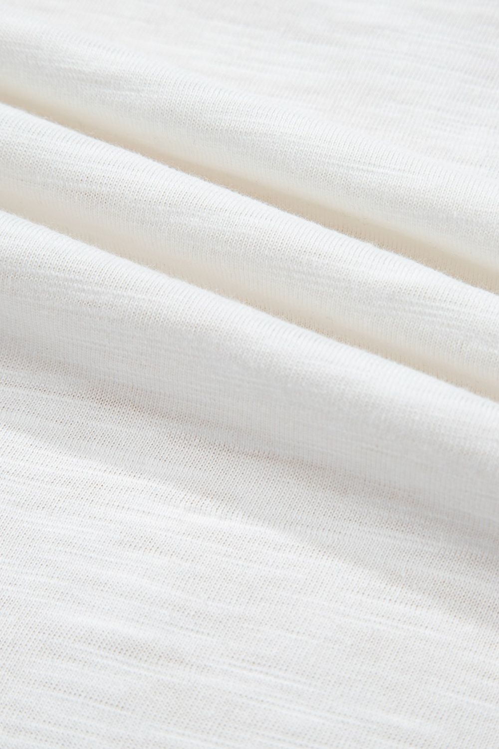 White blouse with textured fabric detail