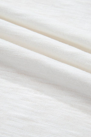 White blouse with textured fabric detail