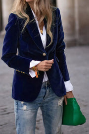 Navy velvet blazer jacket with gold button detail and notched collar.
