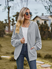 Textured knit dolman sleeve hoodie in Cloudy Blue with zip front and pockets.
