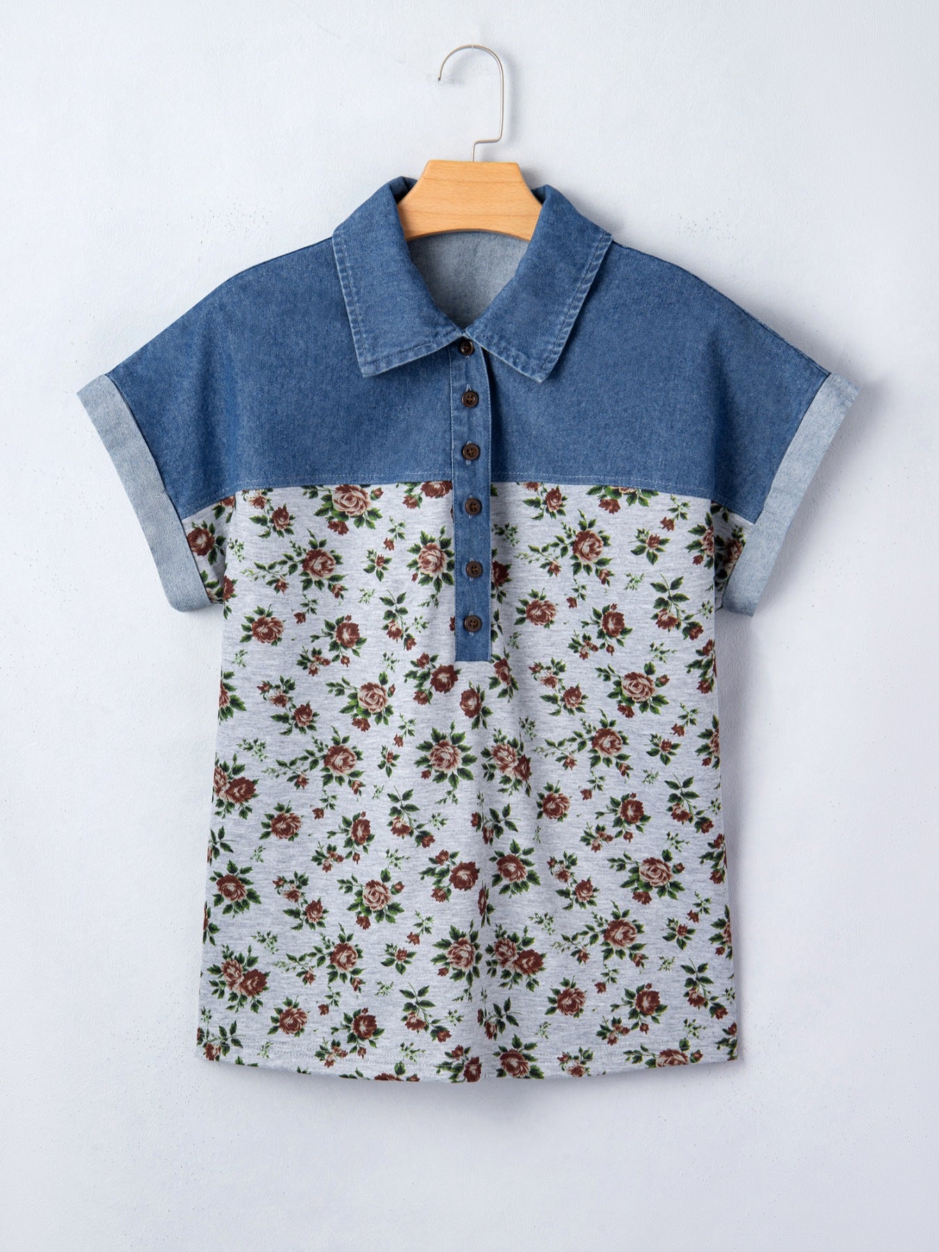 Denim patchwork floral print button-down blouse with cuffed short sleeves.