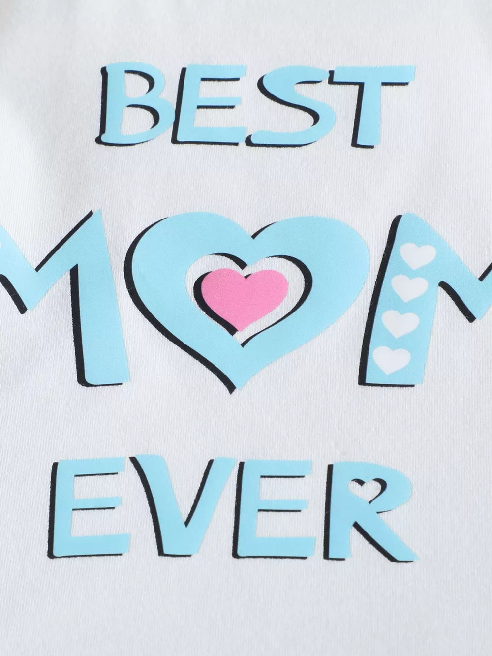 White cotton baby tee with blue "BEST MOM EVER" graphic and pink heart detail.
