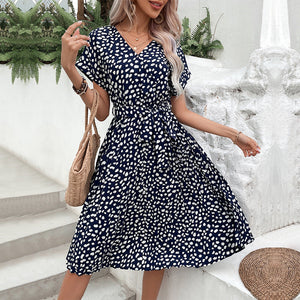 Dark blue dotted print midi dress with tie waist and V-neck