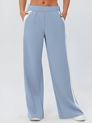 Pastel blue palazzo trousers with contrast white side panels and pockets.