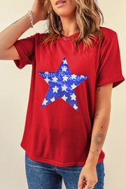 Red cotton blend t-shirt with a distressed blue and white star graphic.