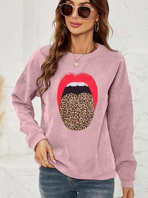 Dusty Pink corduroy crewneck sweatshirt with a red lip and leopard tongue graphic.