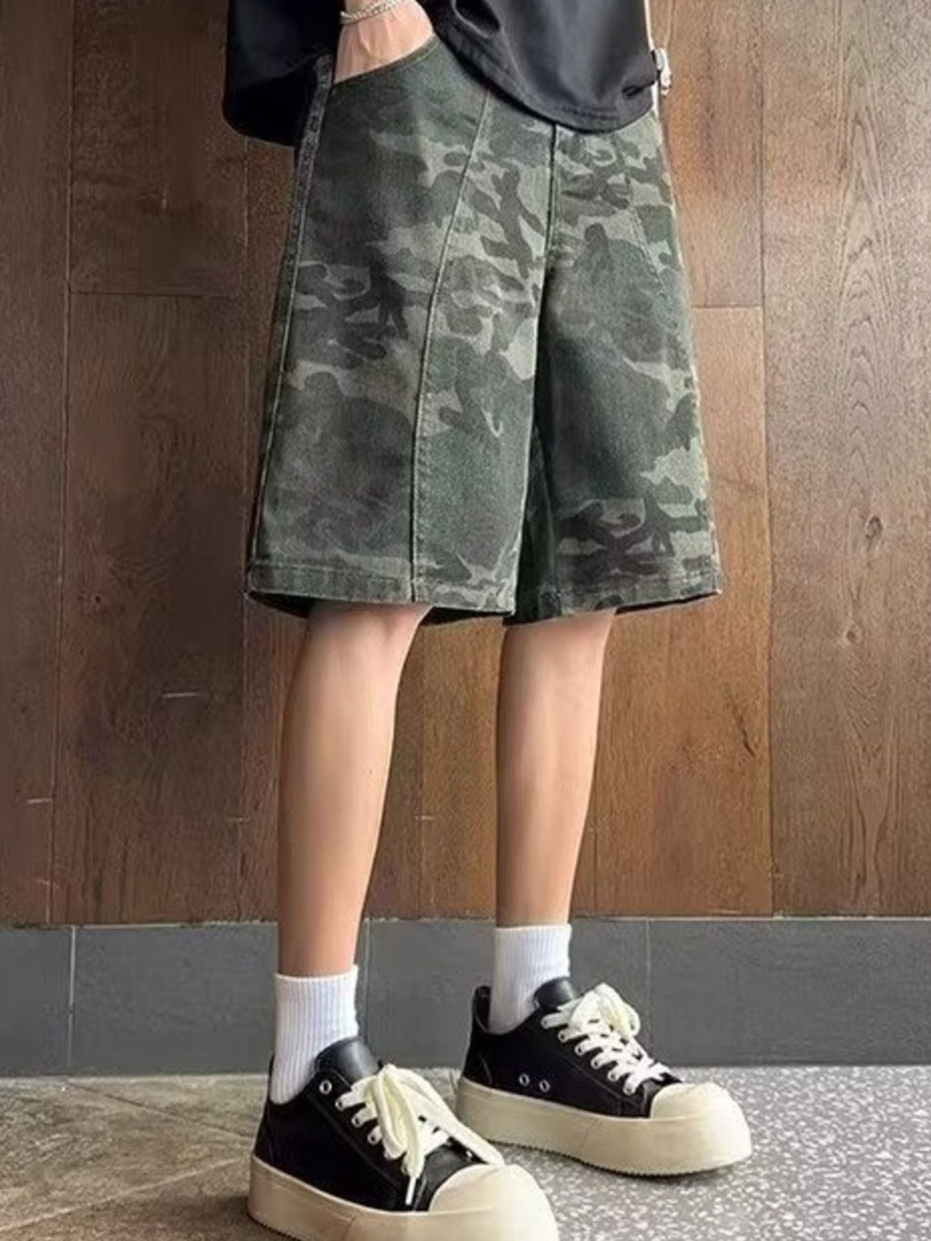 Men's camouflage cargo shorts with a relaxed fit and durable construction.