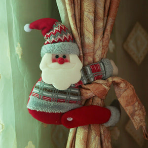 Festive Santa curtain tieback with red hat and plaid sweater, holding curtains.