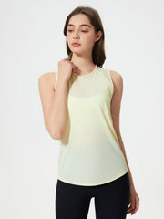 Yellow mesh-back performance tank top with sheer shoulder panels and a rounded hem.