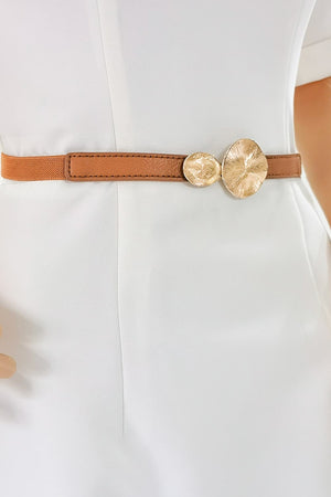 Caramel elastic belt with leather trim and two textured gold disc details.