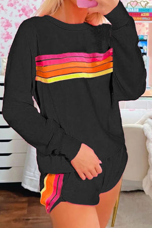 Black loungewear set with retro stripe detail on chest and shorts