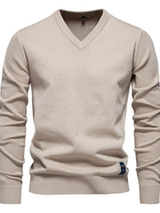Khaki ribbed knit V-neck sweater with long sleeves and a small logo tag detail.