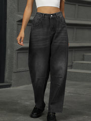 Relaxed patchwork denim trousers in dark wash with a wide leg and knee panel detail.