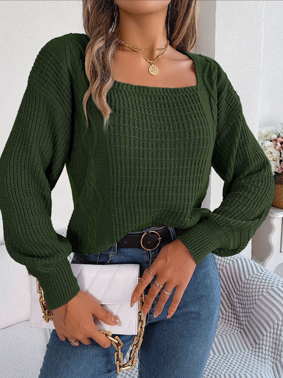 Dark green acrylic cable knit sweater with square neckline and balloon sleeves