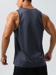 Dark gray performance tank top with a crew neck and athletic fit.