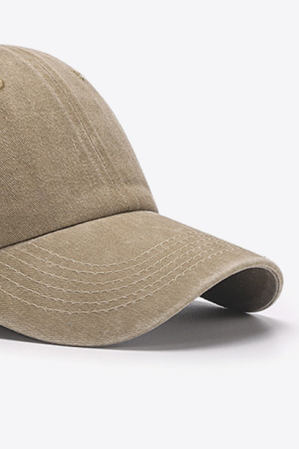 Washed cotton baseball cap in Khaki with stitched brim detail.