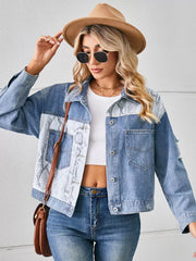 Denim trucker jacket with python pattern panels and pockets.