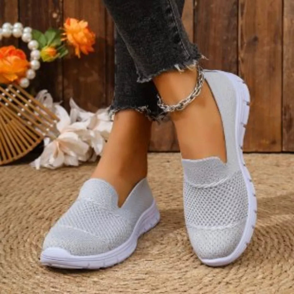Round Toe Flats Slip-ons in Black, editorial view