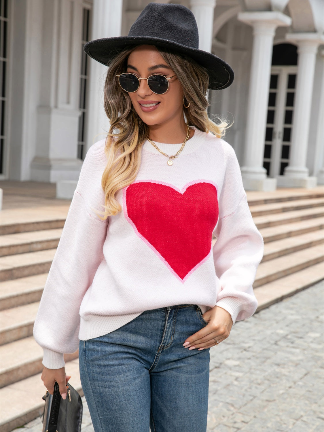 White acrylic sweater with red heart motif and balloon sleeves