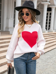 White acrylic sweater with red heart motif and balloon sleeves