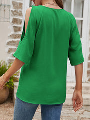 Green textured open-shoulder raglan top with short sleeves