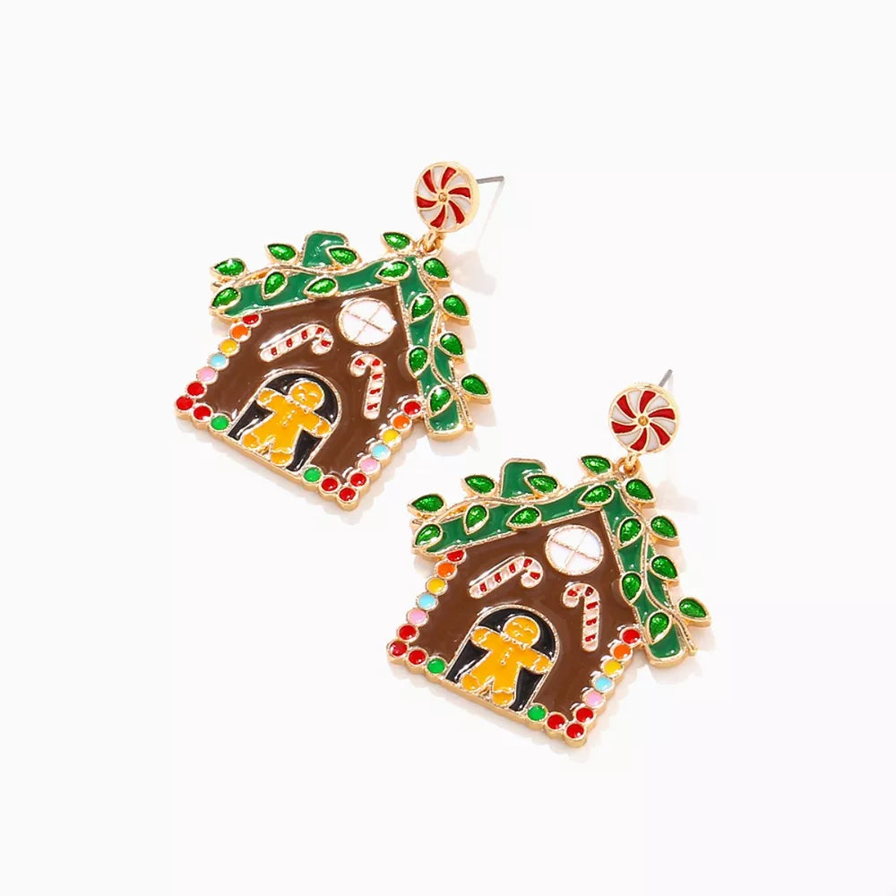Festive gingerbread house dangle earrings with candy canes and gingerbread man detail.