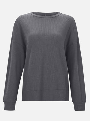 Dark Gray waffle knit crewneck top with relaxed fit and long sleeves.