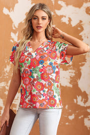 Multicolor floral print V-neck cap sleeve blouse with a casual fit.