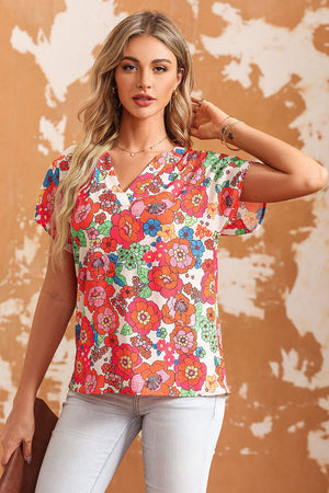 Multicolor floral print V-neck cap sleeve blouse with a casual fit.