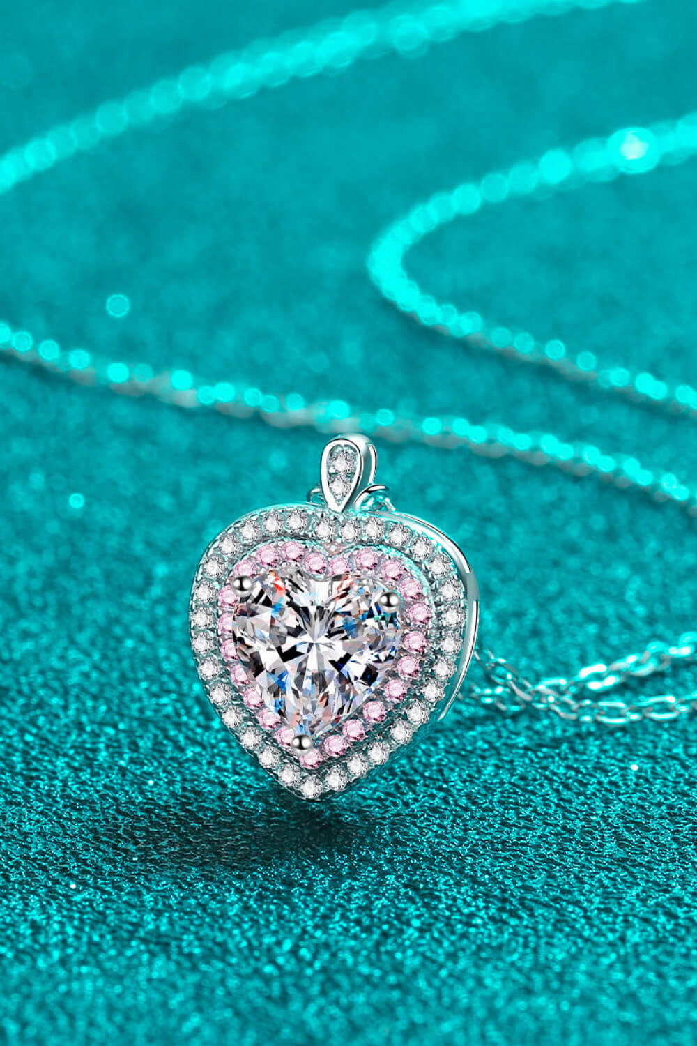 Silver heart halo pendant necklace with moissanite and pink stones