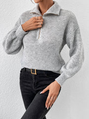 Gray ribbed knit sweater with zip-up collar and balloon sleeves