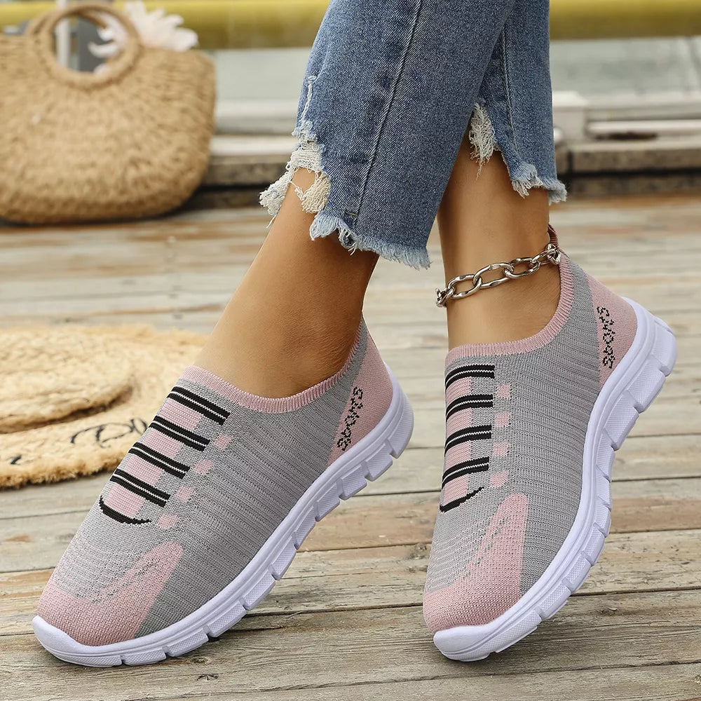 Round Toe Slip-ons in Black, back view