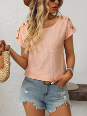 Pink eyelet knit tee with shoulder buttons and short sleeves.